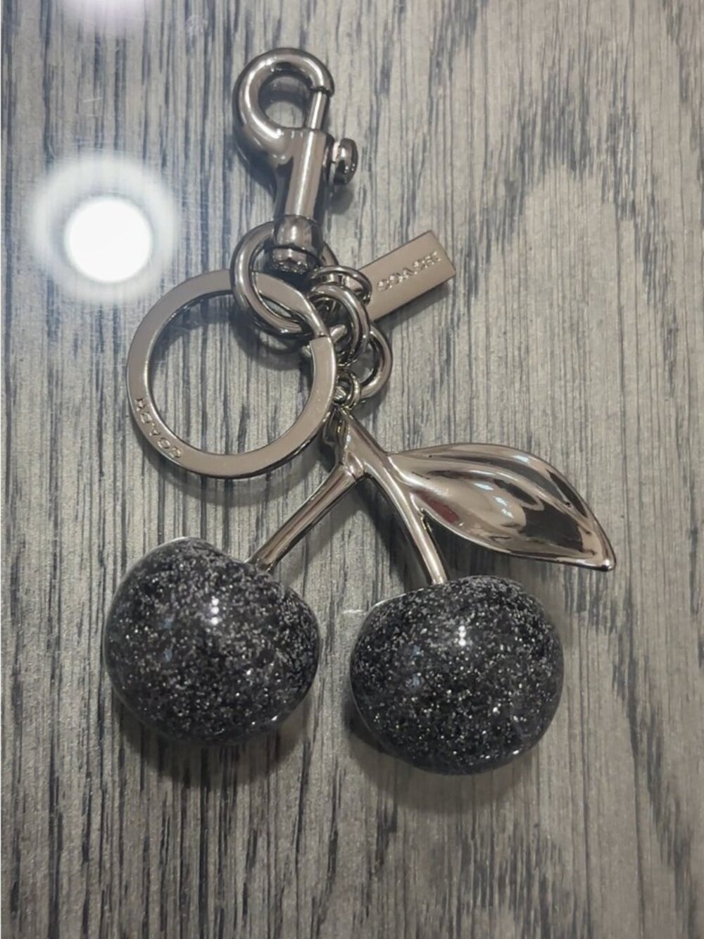 Coach Silver Cherry Keychain with Black Glitter Cherries